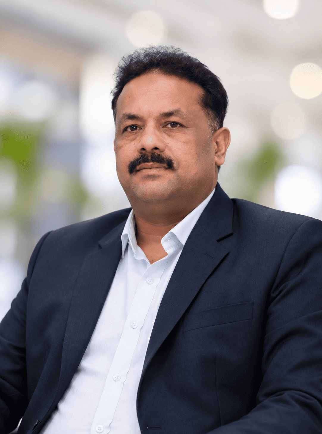 Mr. SUNEER KAYAM POYIL